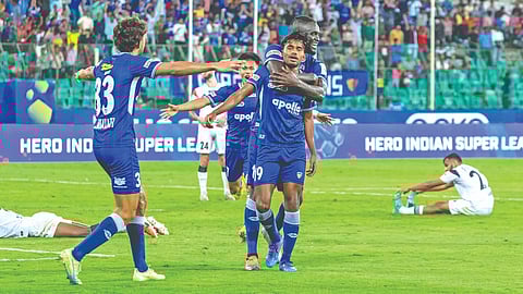 Chennaiyin FC players celebrate the winning goal in the final minute