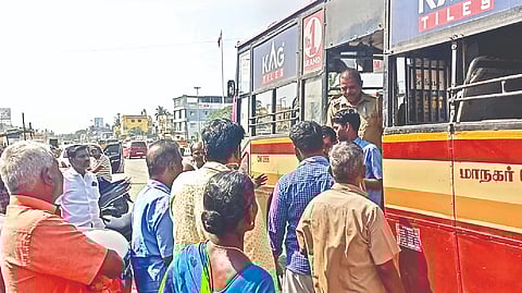 Police officials conducting inquiries with the bus crew and passengers after unruly college students attacked the driver on Camp Road