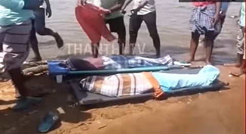 Bodies being laid down at the spot in Karur