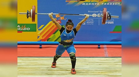 Weightlifter Panchami Sonowal in action during Khelo India Youth Games 2022