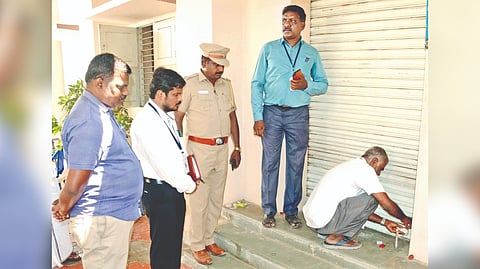 Election officials sealing the
marriage hall in Erode on Thursday