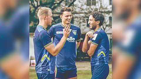 (From left) Chennaiyin FC trio of Julius Duker, Petar Sliskovic and
Nasser El Khayati have a chat during a training session
