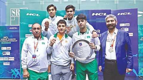 The victorious Pakistan junior men?s team with the top prize