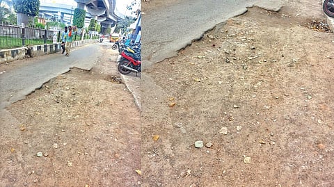 A potholed main road in Tambaram Corporation just below a flyover