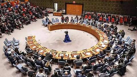 UN Ambassadors vote during a UNSC meeting on a resolution regarding Russia's actions toward Ukraine, at the United Nations Headquarters in New York City.