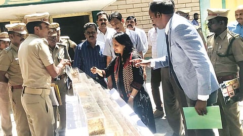 Additional CS Supriya Sahu looks at the seeds on display at the forest institute premises.