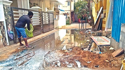 An interior street in Tambaram that is filled with sewage