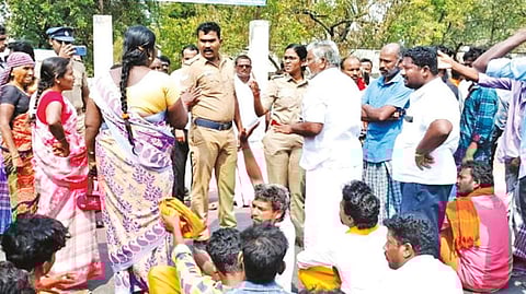 Relatives of the deceased boy arguing with police