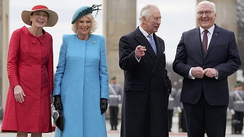 German President Frank-Walter Steinmeier, right, and his wife Elke Buedenbender, left, welcome Britain's King Charles III and Camilla, the Queen Consort