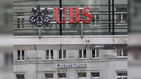 Logos of UBS and Credit Suisse banks are seen in Zurich