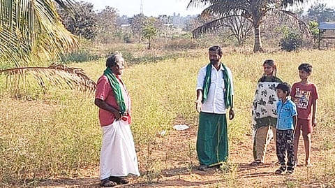 Senthilnathan (centre) and bore well without power