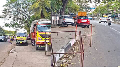 Vehicles seen parked on footpaths on both sides of Greams Road.