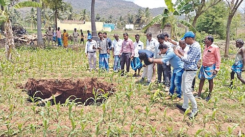 GSI team inspecting and taking pictures of the sinkhole