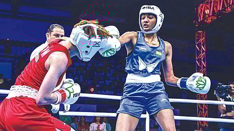 Nitu in action against Madoka Wada of Japan.