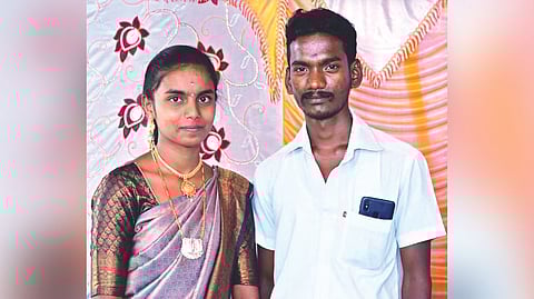 The victim Jagan with his wife in the wedding photo.