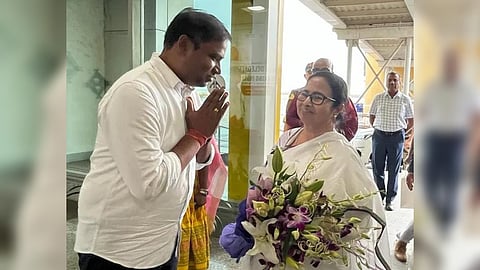 Banerjee at Biju Patnaik International Airport where she was received by Tusharkanti Behera