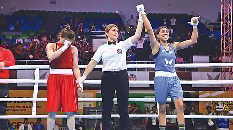 India?s Manisha Moun (right) exults after her win.