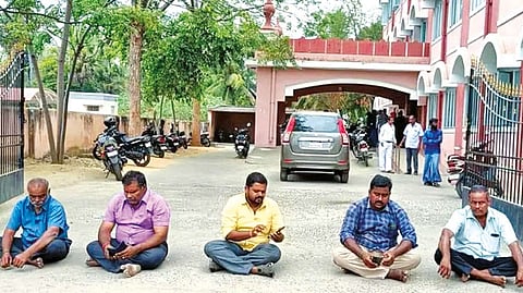 Lorry owners staging a sit-in protest at Theevattipatti police station in Salem on Tuesday