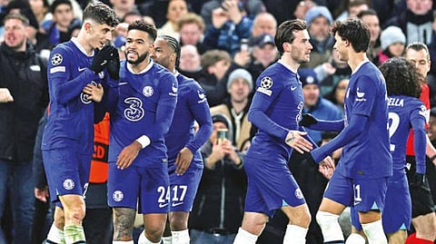 Chelsea players celebrate the team?s second goal in the second leg.