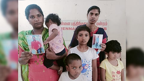 Family members of two Indian migrant workers