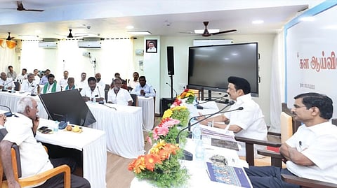 CM Stalin interacting with officials during the meet