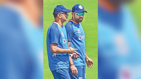 (L-R): Rahul Dravid ; Rohit Sharma