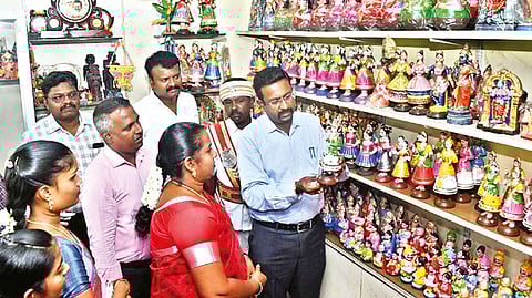 Collector Dinesh Ponraj Oliver visiting one of the stalls run by women SHGs on Wednesday