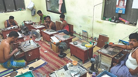 Workers at a gold smithy in Coimbatore