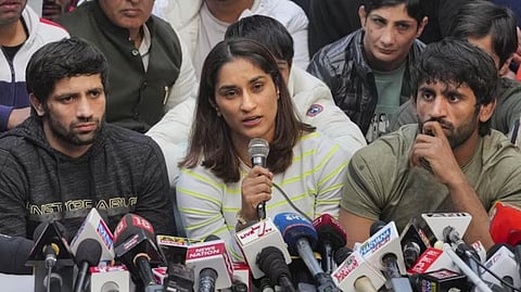 Ravi Kumar, Vinesh Phogat and Bajrang Punia during the wrestlers' protest in New Delhi