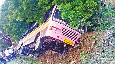 The TNSTC bus that slid into a slope after hitting a tree in Perambalur on Thursday