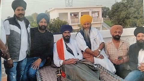 An undated picture 'Waris Punjab De' chief Amritpal's main aide, Joga Singh (in yellow turban), released by Punjab Police.