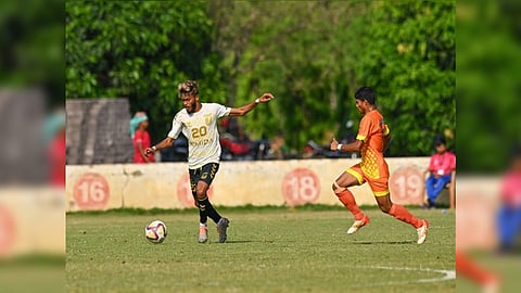 FC Bengaluru United and RKM players in action