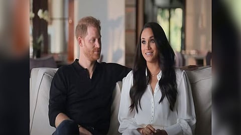 Prince Harry with his wife Meghan Markle