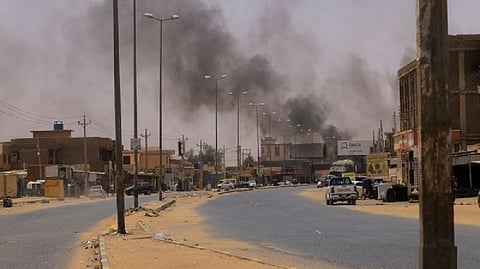 Smoke rises near Halfaya Bridge between Omdurman and Khartoum North.