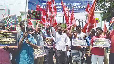 CPM members staging a demo nea May Day Park in Chennai on  Monday