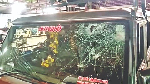 A damaged vehicle belonging to Periyakulam Inspector of police seen after a group pelted stones
at it at Periyakulam, Theni district, on Friday night