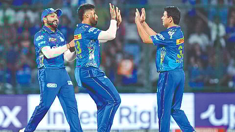 Mumbai Indians? Piyush Chawla celebrates the wicket of Delhi Capitals batter Rovman Powell