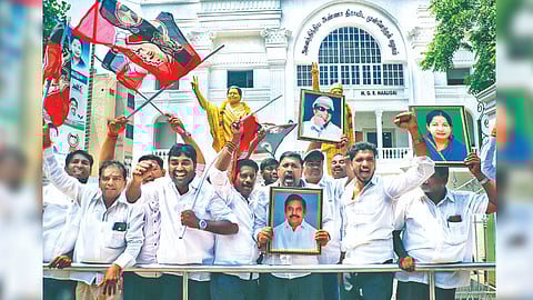 AIADMK cadre celebrating at the party headquarters on Thursday