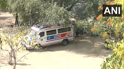 The ambulance carrying the corpse of Asad Ahmad