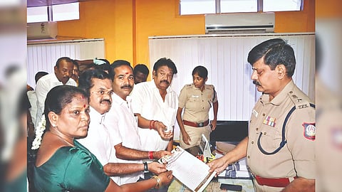 AIADMK leaders led by former MP P Kumar handing over a petition to Deputy Commissioner of Police Suresh Kumar in Tiruchy on Saturday