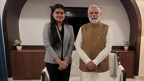 PM Modi with Tanishka Sujit during a meeting in Bhopal