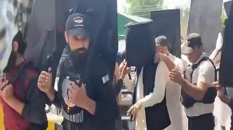 PTI chief Imran Khan entering the court premies in Lahore on Tuesday