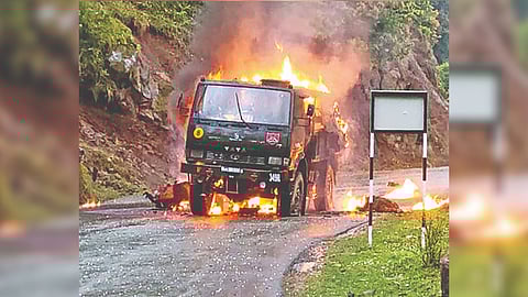 An army vehicle catches fire after a terrorist attack in the Bhatadurain area of Mendhar in Poonch district on Thursday
