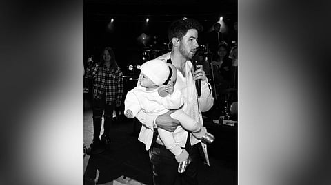 Nick Jonas with his daughter Malti