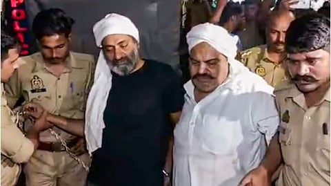 Atiq Ahmed and his brother Ashraf