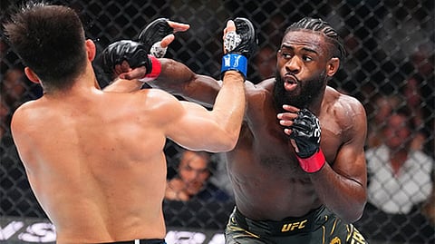 Aljamain Sterling and Henry Cejudo in action