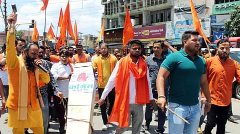 Bajrang Dal members stage a protest against Congress's manifesto for Karnataka Assembly elections on Thursday