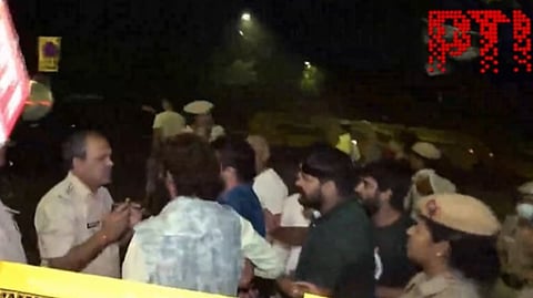 Scuffle between protesting wrestlers and cops