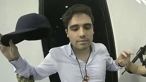 This frame grab from video, provided by the Mexican government, shows Ovidio Guzman Lopez being detained in Culiacan