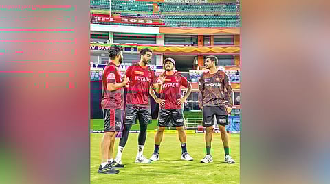 Kolkata players Shardul Thakur, Venkatesh Iyer and Umesh Yadav with Hyderabad?s Bhuvneshwar Kumar on the eve of the match